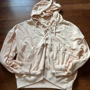 We The Free Lace-Up Hoodie in Light Pink